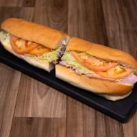 63. McDowell Special Sub · Roast beef, turkey, ham, Swiss and American cheese. Lettuce, tomato and mayonnaise. It's pac...