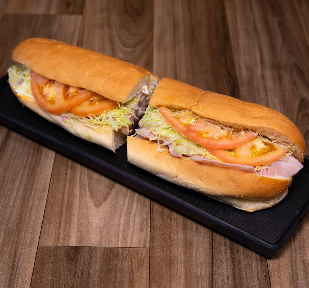 63. McDowell Special Sub · Roast beef, turkey, ham, Swiss and American cheese. Lettuce, tomato and mayonnaise. It's packed!