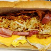Kong Breakfast Sandwich · Eggs, bacon, ham, American cheese and hash browns. Served on fresh baked French bread.