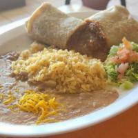 Red Chili Burrito · Beef covered in red chili wrapped in a tortilla. (rice&beans not included