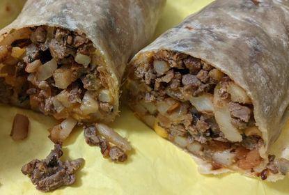 California Burrito · Crispy potatoes, carne asada topped with pico de gallo and cheese wrapped in a flour tortilla.