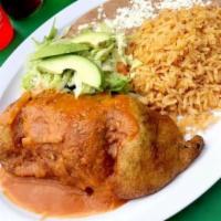 Chile Relleno · Poblano pepper double-battered and fried, stuffed with mozzarella cheese. Served with rice a...