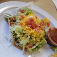 2 Chicken Tostadas · Includes rice, beans and a drink.
