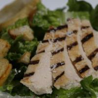 Grilled Chicken Caesar Salad · Chopped romaine, shave Parmesan, grilled chicken, sourdough croutons and Caesar dressing.