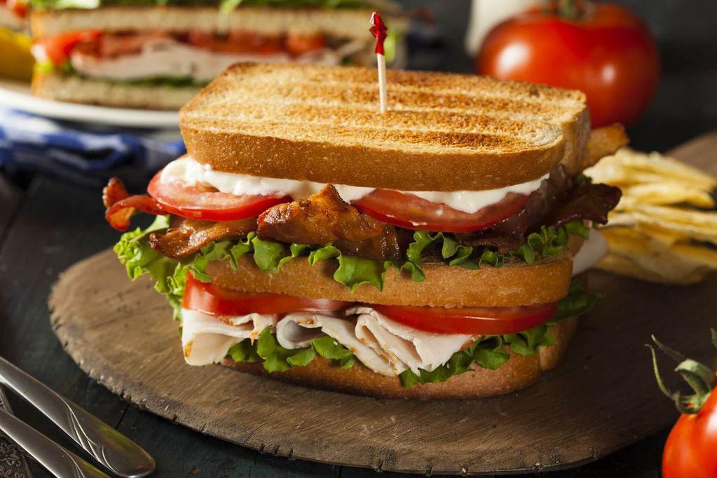 Turkey Club  · Turkey, cheese, lettuce, tomato, bacon, mayo.