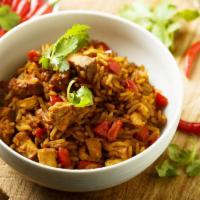 2. Mexican Rice Bowl · Beef or chicken, lettuce, beans, tomato, cheese.