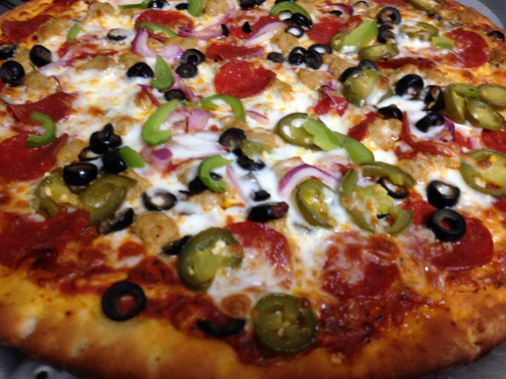 Most Popular local Pizza  The KINGS · Pepperoni, Italian Sausage, Onions, Black Olives, Green Peppers, Mushrooms Jalapenos Seasoned with red peppers and parmesan cheese.