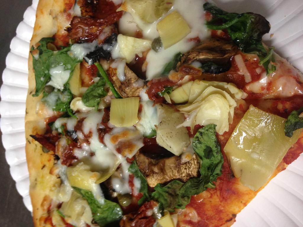 The soul of Kapahulu Pizza · Spinach, Artichoke, Onions, Mushrooms, garlic and Fresh Tomatoes.