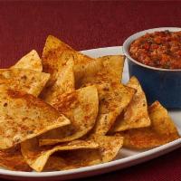 Spicy Salsa with Chips · Our salsa is made spicy with delicious flavor.