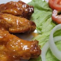 Sassy Chili Wings · Fried wings covered in our chili sauce. (3 Pieces)