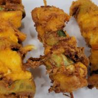Skewer Me Chicken · 3 pieces of fried chicken in each skewer, with onions and bell peppers and jalapeño. Comes w...