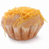 Ensaymada · 6 pieces. Sweet brioche topped with creamed butter and sugar, and real cheese.