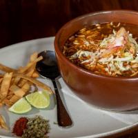 Cup Pozole · Pork shoulder, ancho chile, hominy, mexican oregano, radish, cabbage, tortilla strips, lime
