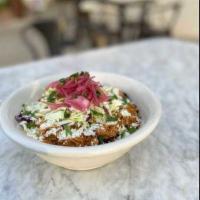 Baja Bowl · Chipotle and tomato braised chicken, cabbage, chipotle aioli, pickled onions, cotija, cilant...
