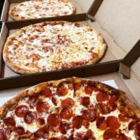 Double Deal Special · 2 large pizzas with 2 toppings each.