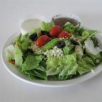 Garden Salad · Lettuce, tomatoes, black olives, croutons and cheese. Served with our creamy Italian and Ita...