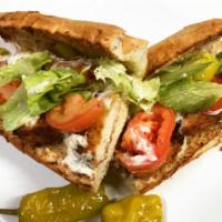 Chicken Strips Sub · Chicken breast tender, house dressing, lettuce, tomatoes, pepperoncini and baked with cheese. 