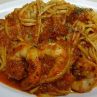 Shrimp Fra Diavolo · With spicy marinara sauce over your choice of pasta. Includes salad and garlic bread.