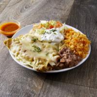 Enchiladas · Enchiladas red or green sauce.  Served with rice and beans. If you don't want chicken please...