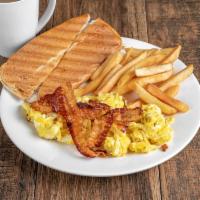 American style breakfast #1 · Built with your style egg, cheddar cheese, bacon or ham, french fries, small coffee, and cub...