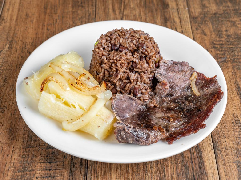 Fried Pork  · Cuban style fried pork, with grilled onions and rice and beans. 
