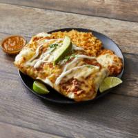Burrito Suizo · Topped with melted cheese, sour cream, guacamole and a choice of sauce. Spicy.