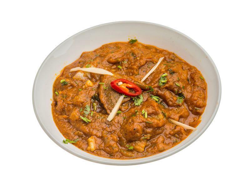 Chicken Vinaloo · Chicken cooked with hot spices and vinegar.