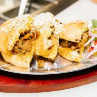Naan Chaap Sandwich · Choice of Chicken Bhuna or Lamb Bhuna