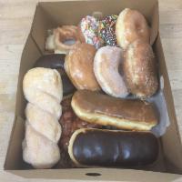 1 Dozen Special Mix Donuts · Mix old fashion, cake, round donuts, bar, twist, and jelly.
