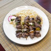 Beef Kebab · 2 skewers of marinated beef tenderloin grilled over an open flame served with rice pilaf. Gl...