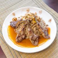 Lamb Chops · Domestic lamb chops grilled and served with hashwee rice