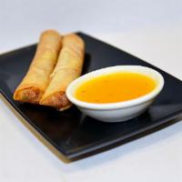 2 Spring Rolls · Cabbage, celery, carrots, and bean thread noodles wrapped in a spring roll wrapper. Served w...