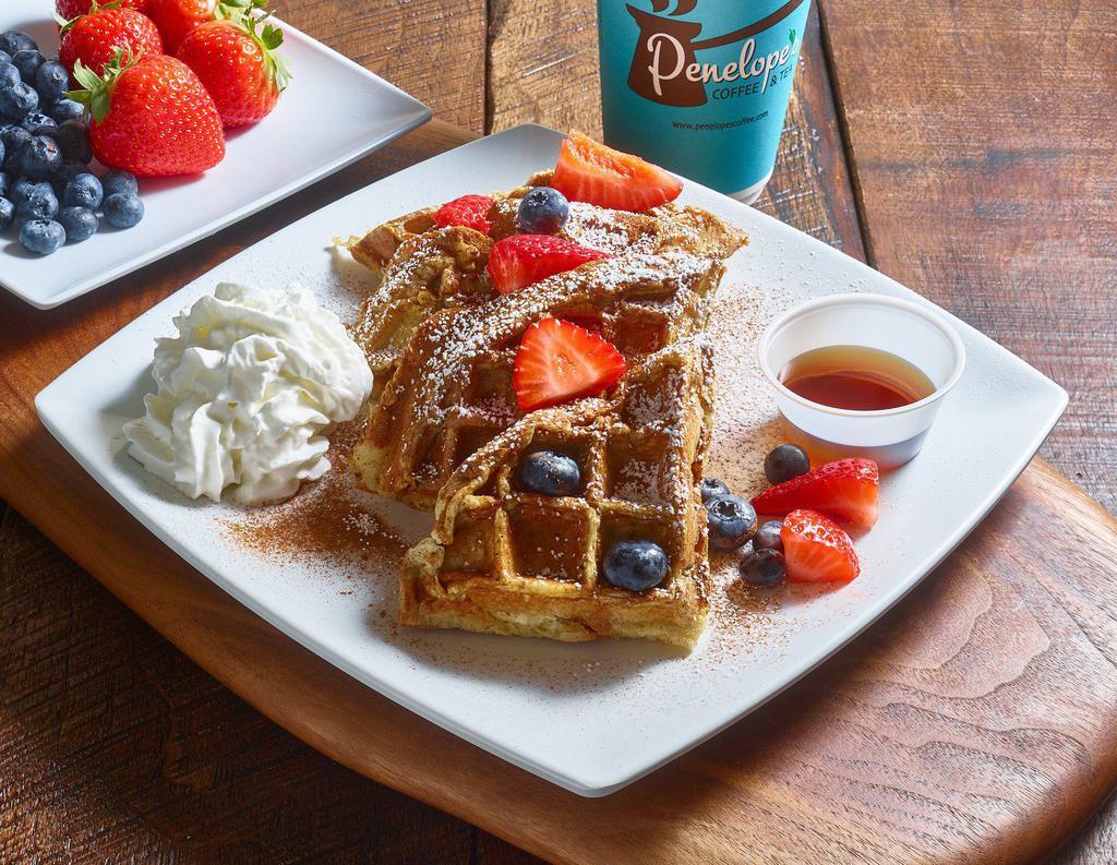 Fresh Belgian Berry Waffle · Waffle topped with strawberries, blueberries and whipped cream.