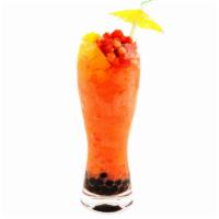 The Monkey Slushie · Peach and strawberry juice blended with fresh strawberries; mixed with strawberry and peach ...