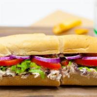6. Chicken Salad Sub · Oven-roasted chicken salad with cranberries, lettuce, tomatoes, onions.