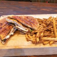 Fig Panini · Grilled chicken, fig jam, fresh mozzarella, arugula on fresh-baked focaccia with french frie...