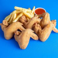 Chicken Wings Dinner · Cooked wing of a chicken coated in sauce or seasoning.