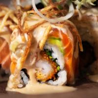Zuke Salmon Roll · Crispy panko-breaded shrimp inside, topped with soy-marinated seared salmon sashimi. Finishe...