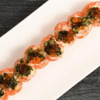 Salmon Caviar Roll · Salmon sashimi wrapped around rice with an onion chutney; topped with salmon caviar and fini...