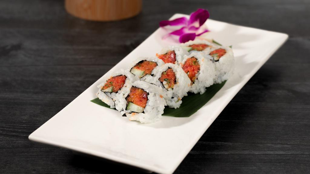 Spicy Tuna Roll · Spicy tuna with cucumber and sushi rice. 8pcs served in seaweed paper.