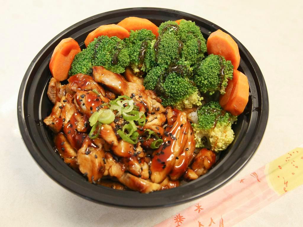 Colossal Chicken · Chicken teriyaki. Includes white rice and assorted vegetables.