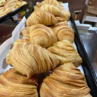 Homemade Sfogliatella · Crispy clam shell pastry filled with a custard and baked.