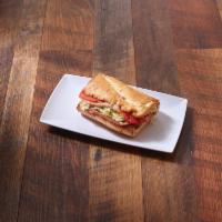 Spicy Monterey Sub · Turkey, Ham, Provolone, Pickles, Lettuce, Tomatoes, Mayo, and Four Pepper Chili Sauce.