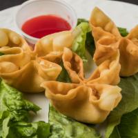 3. Crab Rangoon · Fried wonton wrapper filled with crab and cream cheese. 