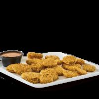 Fried Pickle Nickels · Golden-fried dill slices served with
Campfire Mayo.