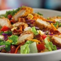 Crispy Chicken Tender Salad · Chicken tenders, hard-boiled eggs, hardwood-smoked bacon crumbles, tomatoes, croutons and Ch...