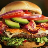 The Madlove Burger · A Cheddar-and-Parmesan crisp, Provolone, Swiss, jalapeño relish, candied bacon, avocado, cit...