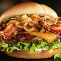 The Southern Charm Burger® · Brown sugar glaze, candied bacon, Whiskey River® BBQ Sauce, extra-sharp Cheddar, caramelized...