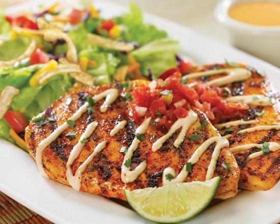 Ensenada Chicken™ Platter · Two ancho-seasoned chicken breasts,
house-made salsa and salsa-ranch dressing.
Served with a mixed greens salad with Cheddar,
tomatoes and tortilla strips.