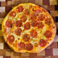 Woodstock Pepperoni Pizza · Red sauce, local cheese, pepperoni, garlic, oregano, extra virgin olive oil and herb blend.